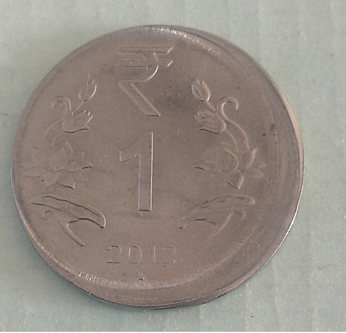 India Indein..2012.. 1 Rupee Error Coin..Hyderabad Mint - India