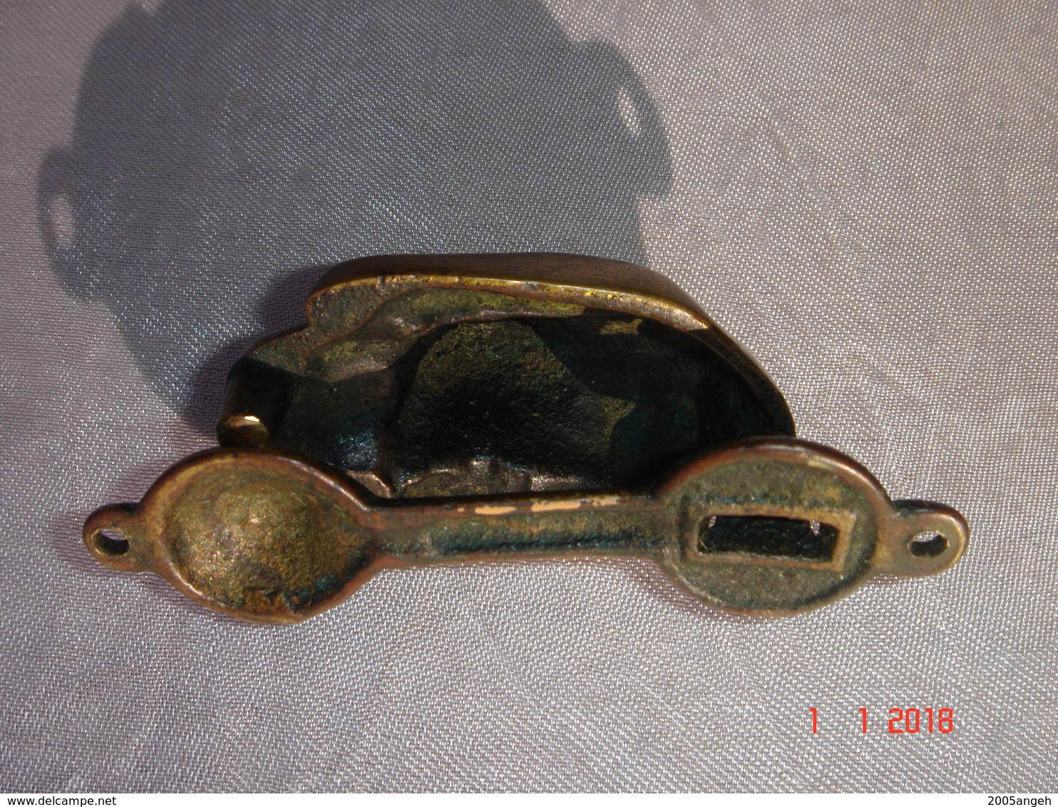 Petit Heurtoir En Bronze Tête De Chien -  Poids 71 Grs. Long. 8,4 Cm - Bon état. - Bronzes