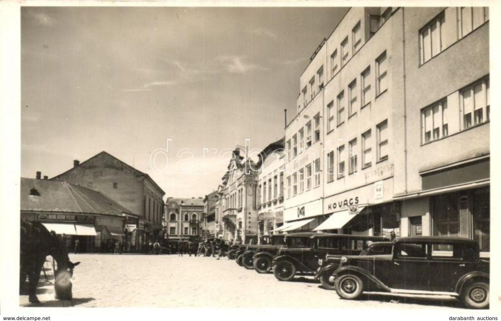 ** T1/T2 Ungvár, Uzshorod, Uzhorod; Utcakép, Kovács, Cikta, Feldman, Neumann üzlete, Automobilok / Street View, Shops, A - Ohne Zuordnung