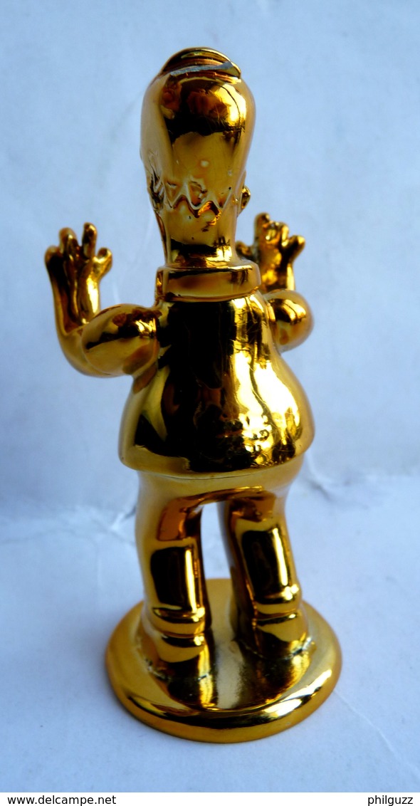 FIGURINE SIMPSON BART PLASTIQUE CHROME OR Petit Accident - Simpsons