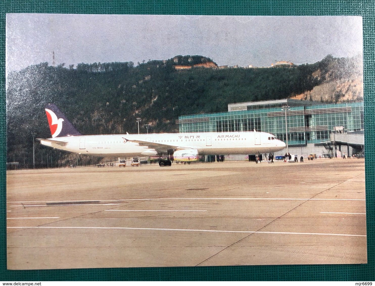 MACAU A VIEW OF THE PLANE AT THE APRON OF THE MACAU INTERNATIONAL AIRPORT - China