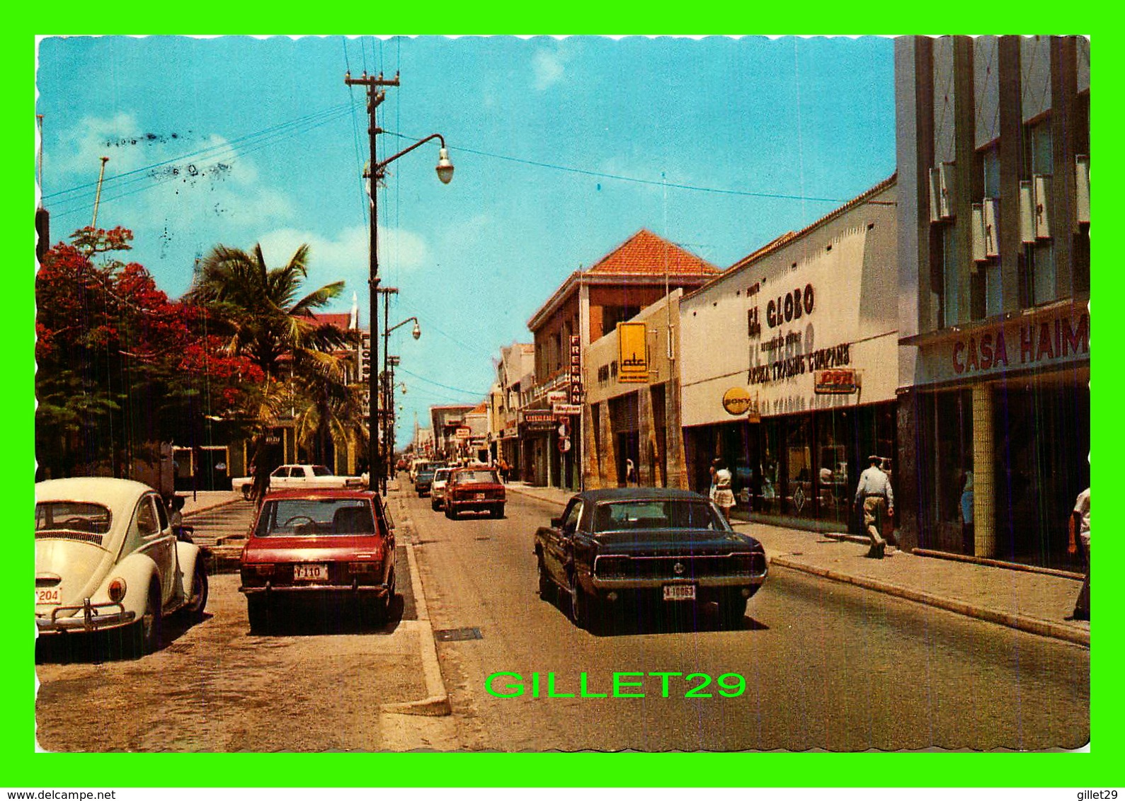 ARUBA, NETHERLANDS ANTILLES - NASSAUSTRAAT, THE MAIN FREEPORT SHOPPING CENTRE - ANIMATED WITH OLD CARS -TRAVEL IN 1971 - - Aruba