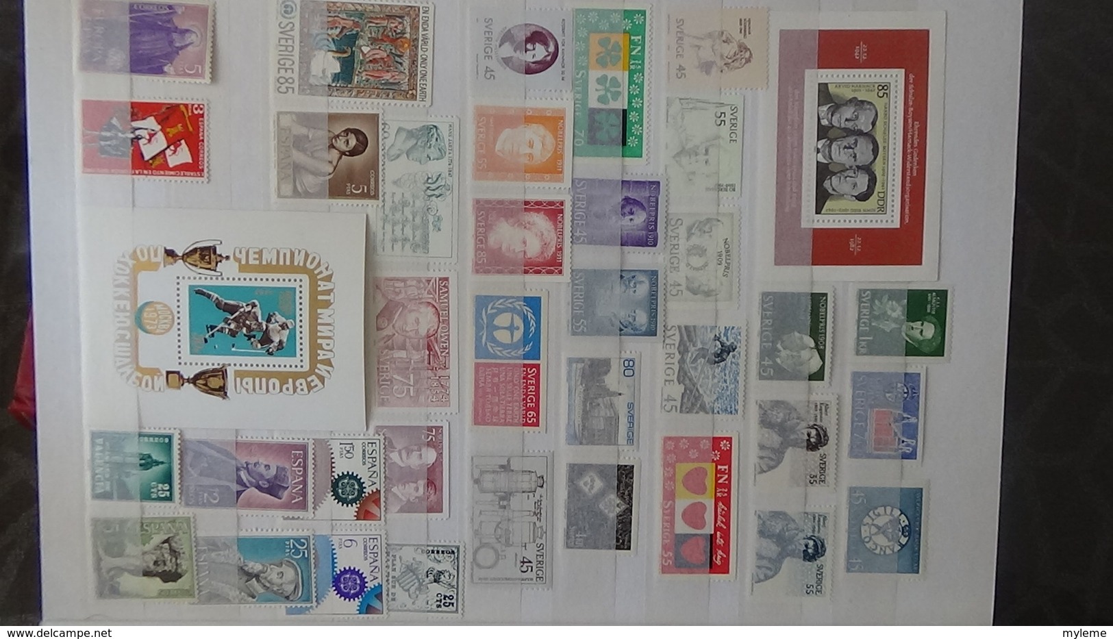 Gros album (64 photos) de timbres et 151 blocs ** de divers pays dont quelques NON DENTELES. Côte très sympa