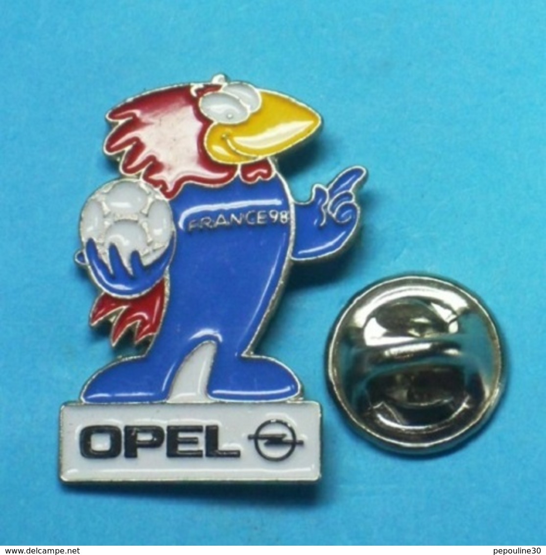 1 PIN'S //    ** FOOTIX / MASCOTTE DE FRANCE '98 / SPONSOR // OPEL ** . (© 1995 ISL™) - Opel