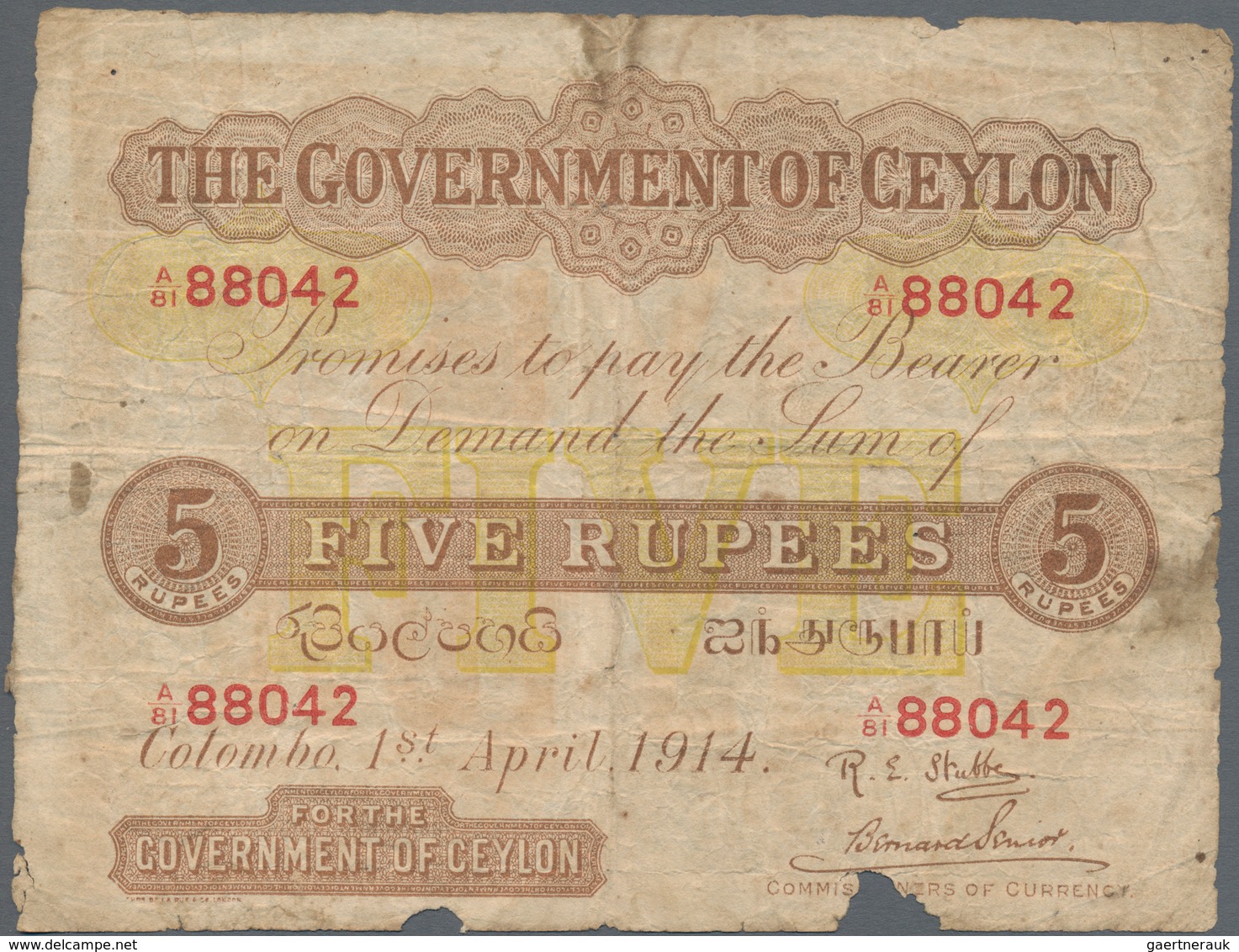 Ceylon: 5 Rupees 1914 P. 11b, Rare Larger Size Note In Used Condition With Several Folds And Creases - Sri Lanka