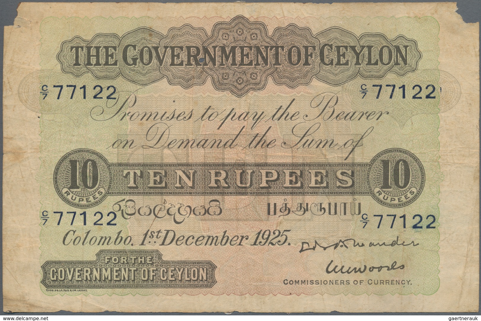 Ceylon: 10 Rupees 1925 P. 12c, Used With Folds And Creases, Light Stain In Paper, Upper Left And Rig - Sri Lanka