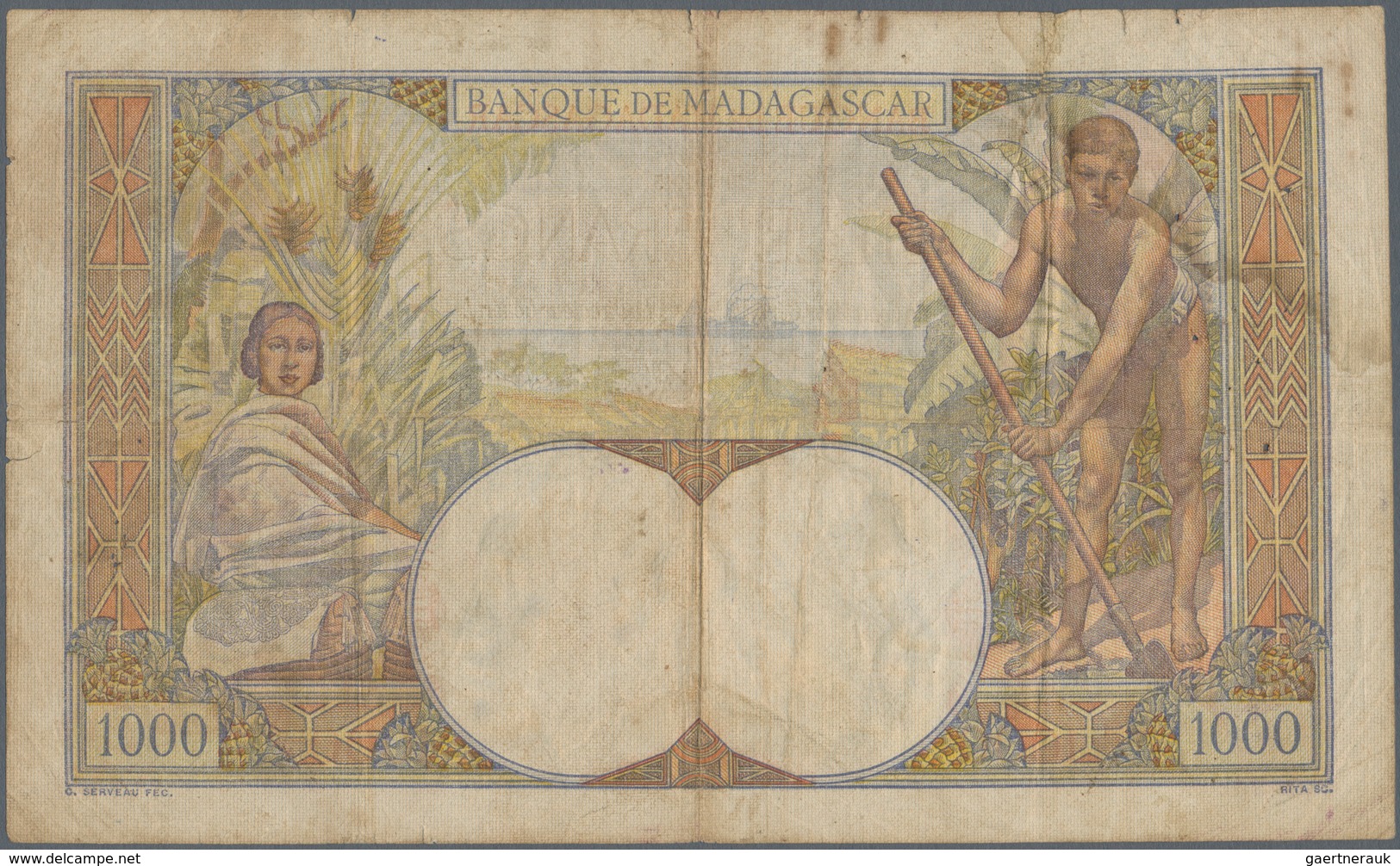 Madagascar: 1000 Francs 1945 P. 41, Used With Folds And Creases, Stain In Paper, One 1,5cm Tear At U - Madagaskar