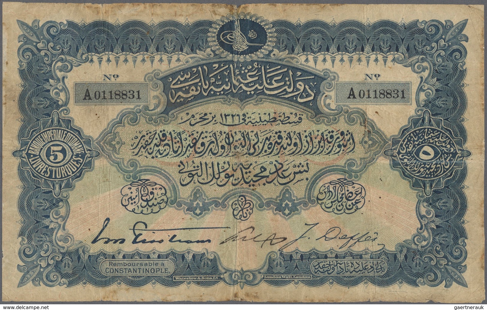 Turkey / Türkei: 5 Livres 1909 P. 64a, Used With 3 Strong Vertical And One Horizontal Fold, Stained - Turkije