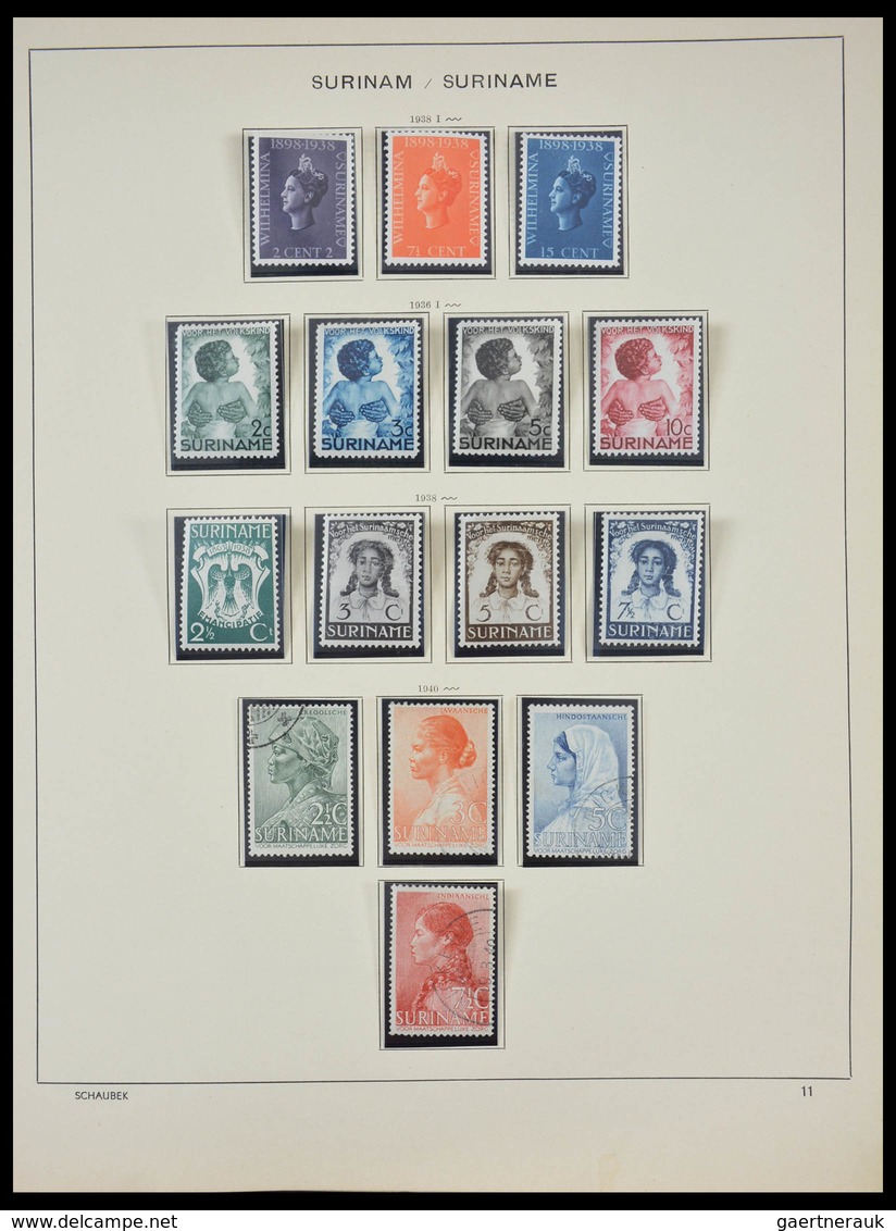 Surinam: 1873-2000: Almost complete, mostly MNH and mint hinged collection Surinam 1873-2000 in over