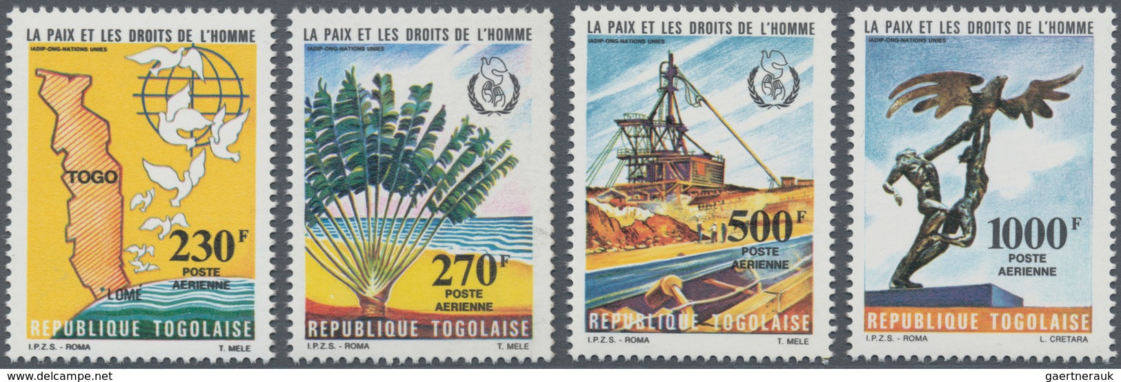 Togo: 1985, Peace And Human Rights Complete Set Of Four (dove Of Peace, Palm Tree, Mining And Sculpt - Togo (1960-...)