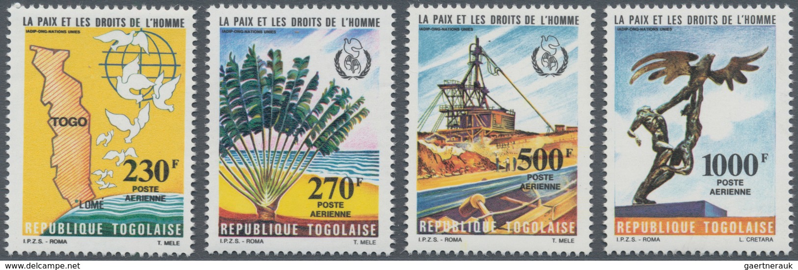 Togo: 1985, Peace And Human Rights Complete Set Of Four (dove Of Peace, Palm Tree, Mining And Sculpt - Togo (1960-...)