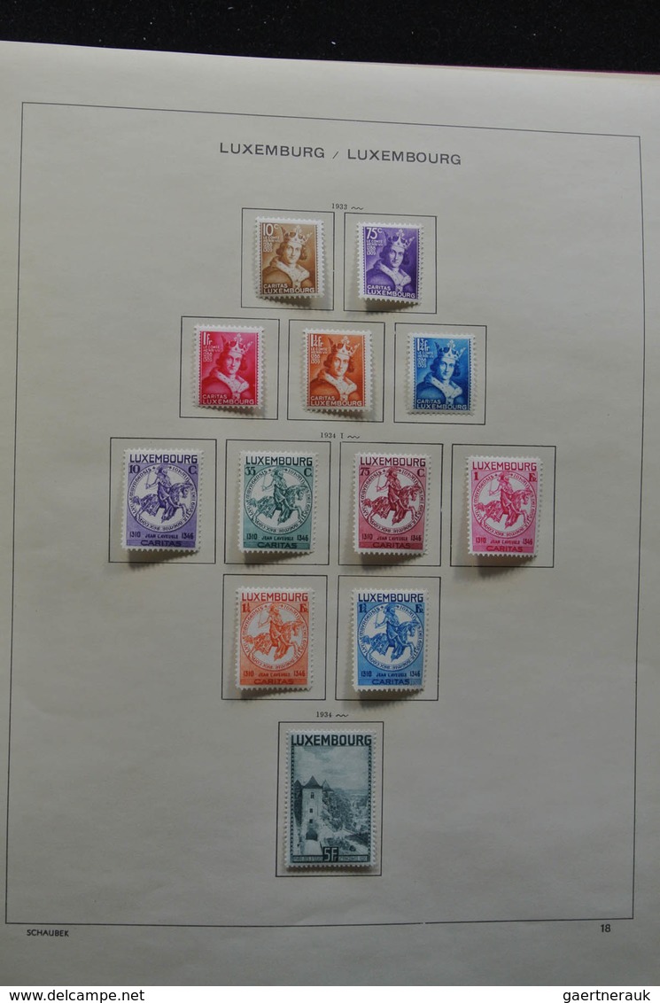 Luxemburg: 1875-1974: Well filled, mint hinged collection Luxembourg 1875-1974 in Schaubek album. Co