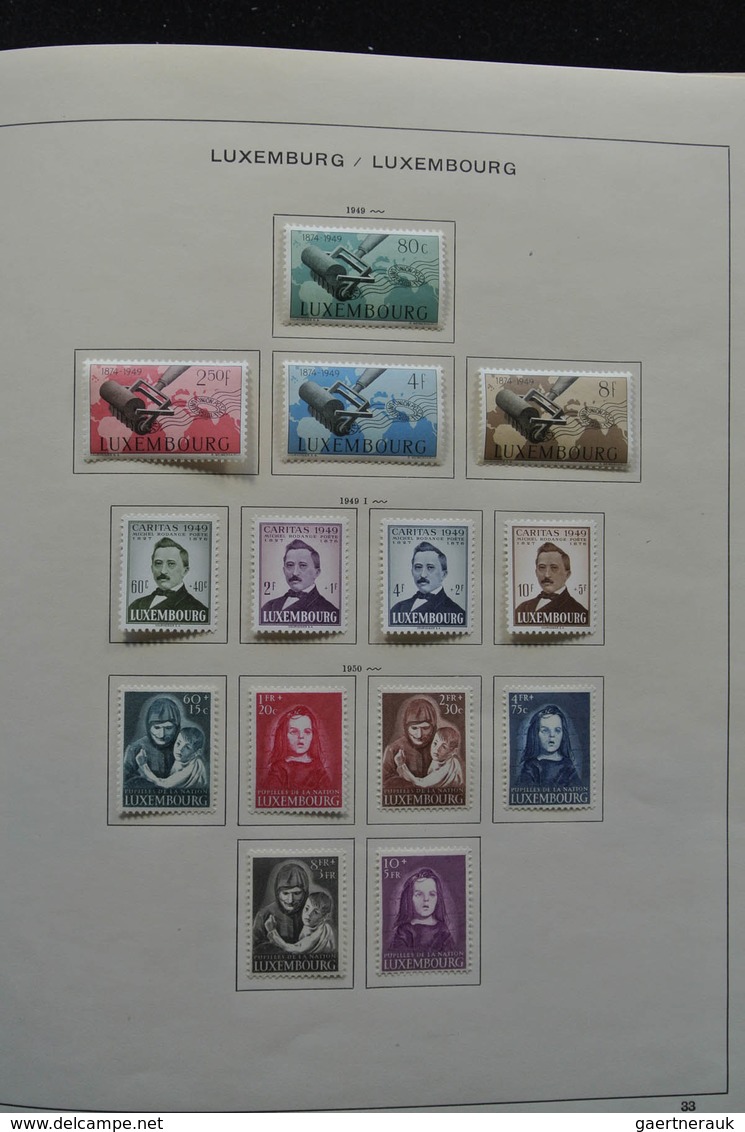 Luxemburg: 1875-1974: Well filled, mint hinged collection Luxembourg 1875-1974 in Schaubek album. Co