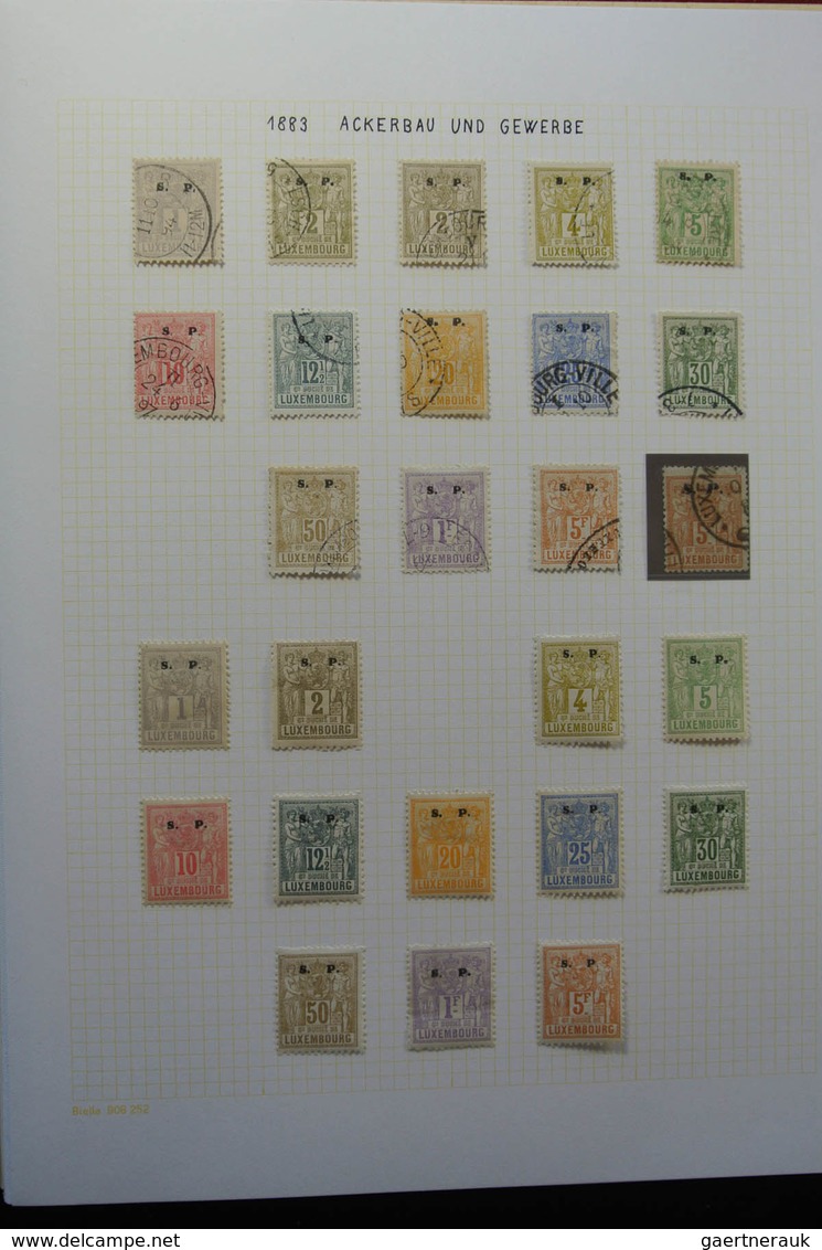 Luxemburg - Dienstmarken: 1875-1935: Very well filled, mint hinged and used, partly double collectio