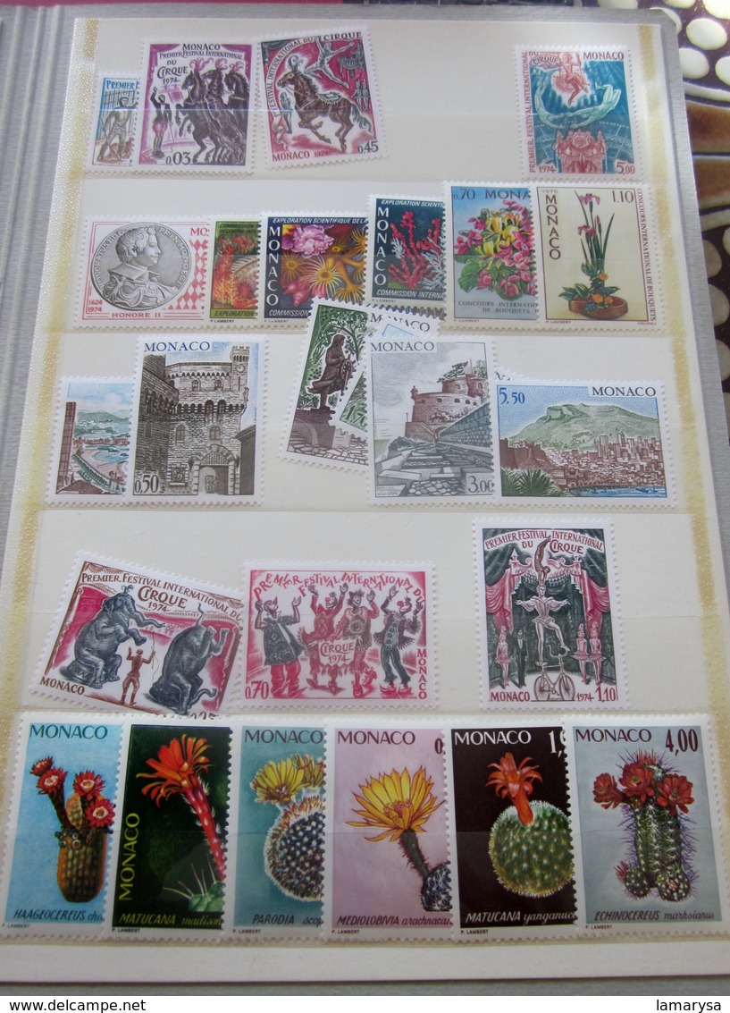 MONACO Lot de 81 timbres en Neuf ** MNH dans album pochette bandes  Marini Belle cote Générale faire défiler les scanns