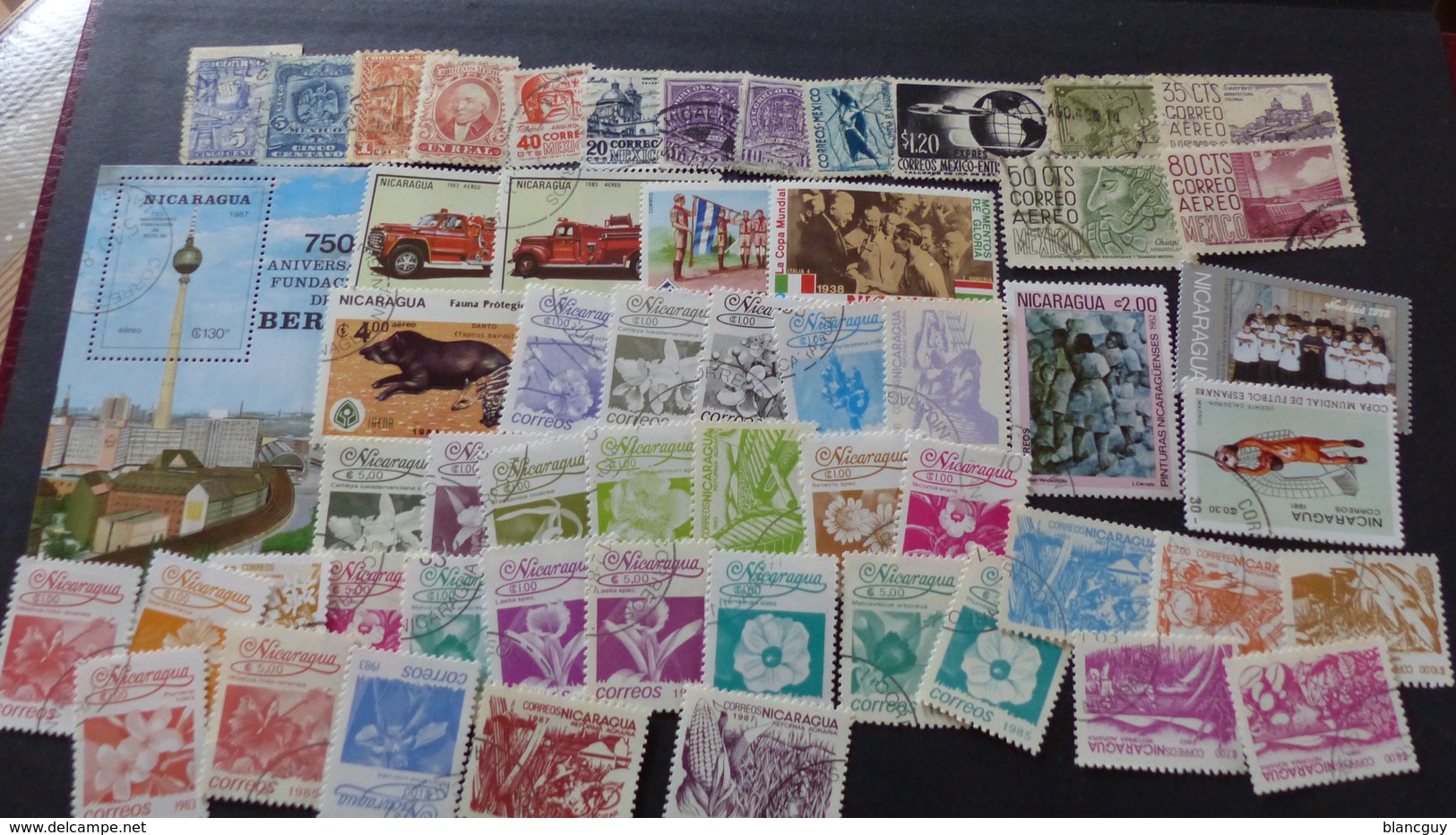 AFRIQUE - AMÉRIQUE - ASIE - OCÉANIE - 2400 timbres tous différents neufs et oblitérés