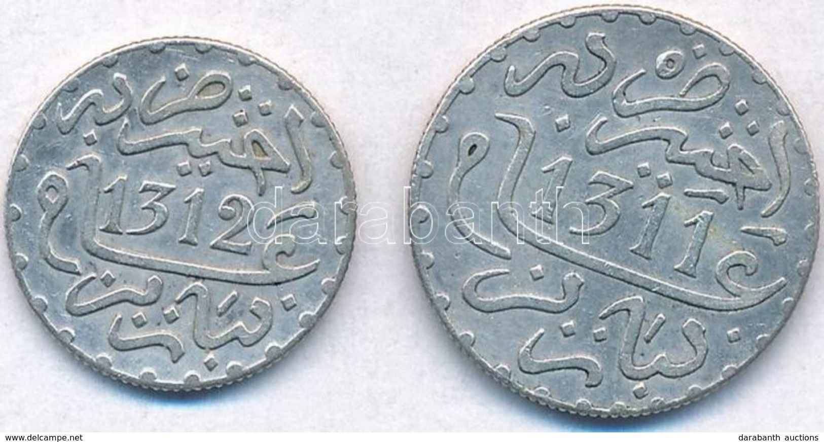 Marokkó 1894. (1311) 1D Ag + 1895. (1312) 1/2D Ag T:2
Morocco 1894. (1311) 1 Dirham Ag + 1895. (1312) 1/2 Dirham Ag C:XF - Unclassified