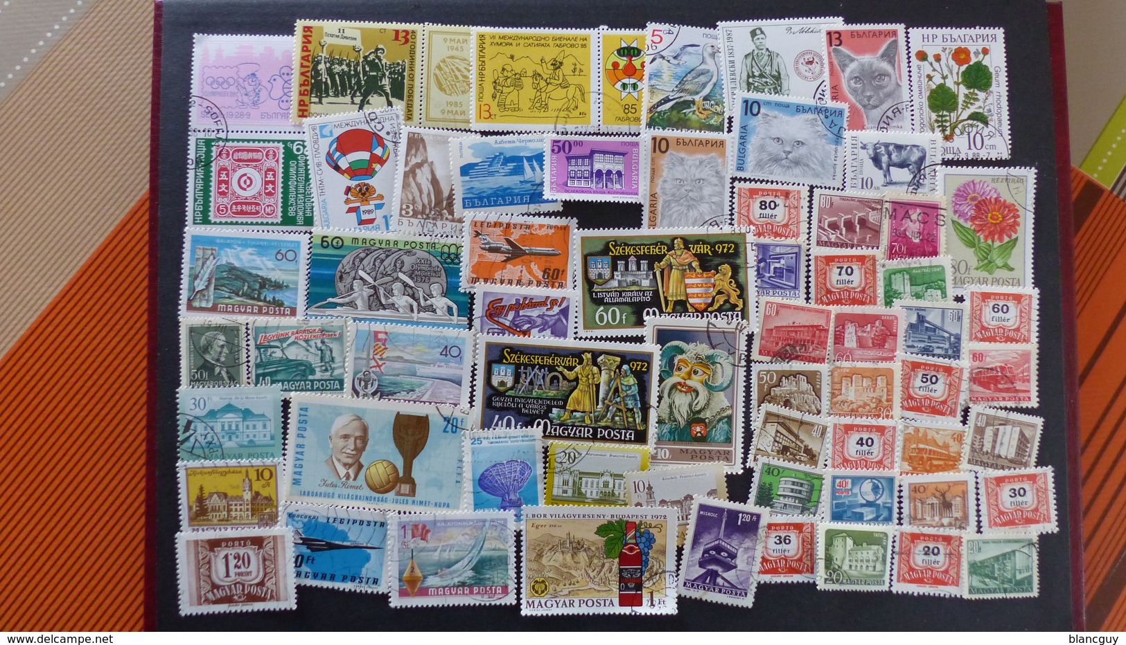 Vrac de 3100 timbres oblitérés du monde, quelques neufs, tous différents