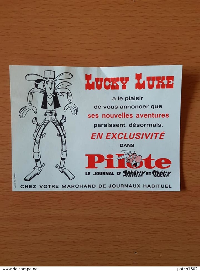 Lucky Luke Publicité Pour Le Journal D'astérix Et Obélix  13,5 Cm/10 Cm - Autres & Non Classés