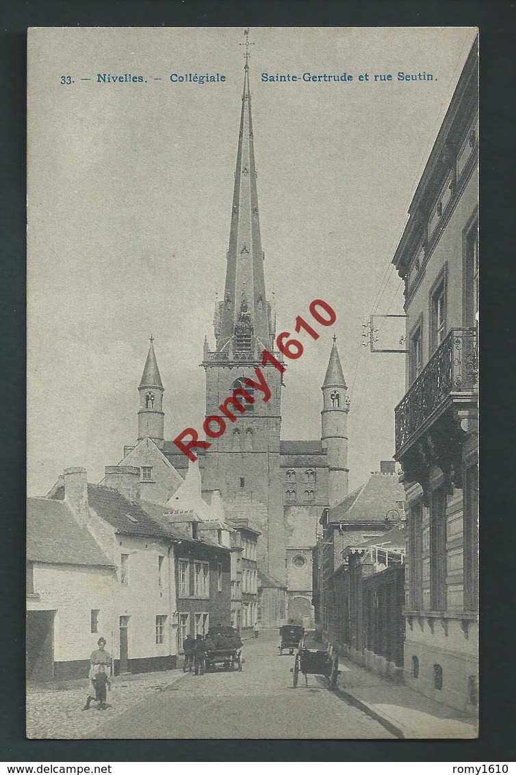 Nivelles. La Collegiale Ste Gertrude Et La Rue Seutin. Animée, Attelages.   H. Bertels, 33. - Nivelles