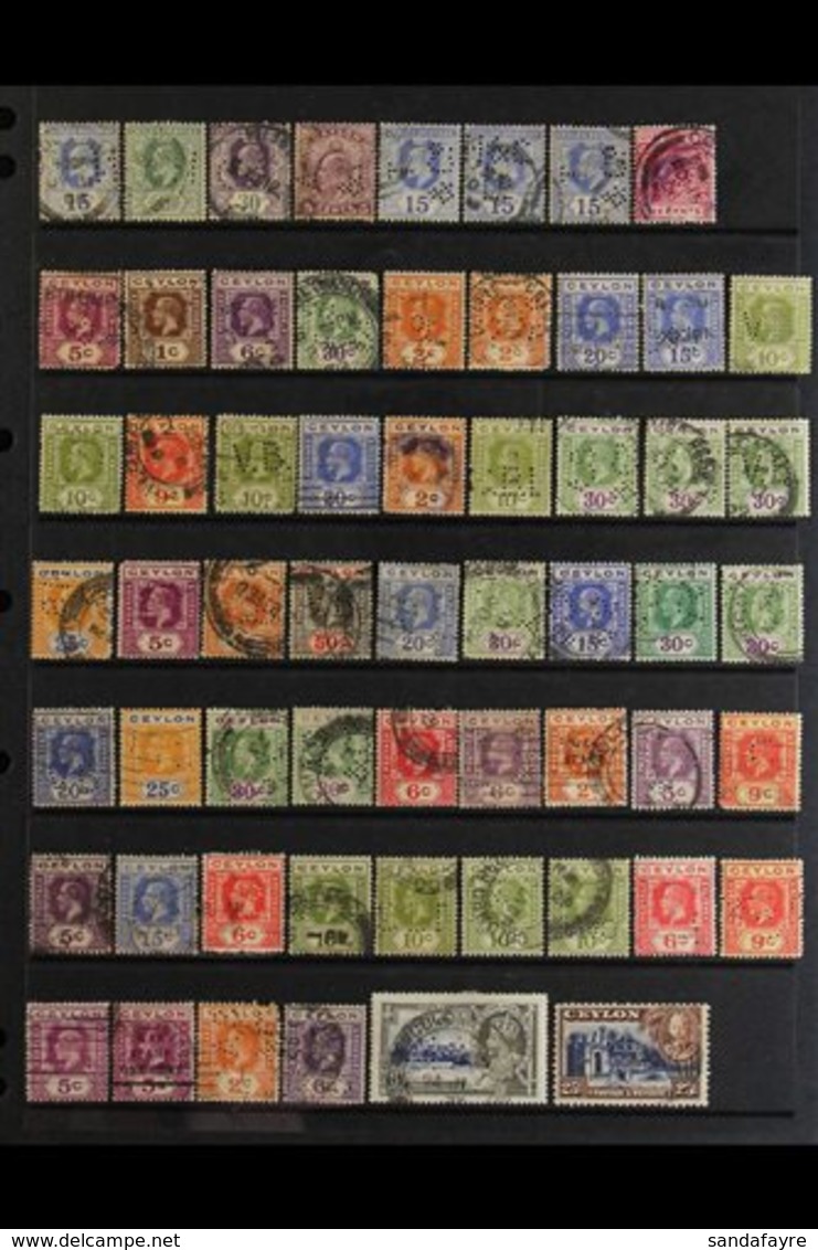 PERFINS 1900's-1950's Interesting collection Of Used Stamps With Various Private COMMERCIAL PERFINS Presented On A Two-s - Ceylan (...-1947)