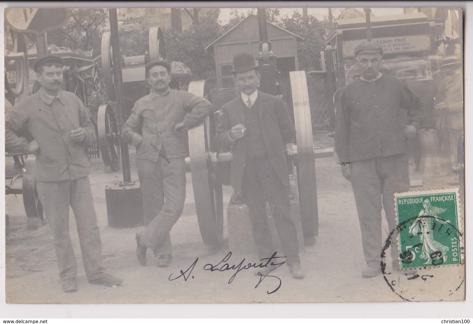 CARTE PHOTO DE 1909  : CONCOURS DE MACHINES INDUSTRIELLES ? - ESSIEUX AVEC ROUES  - GRANDS PRIX - JURES D'HONNEUR - R/V - A Identifier