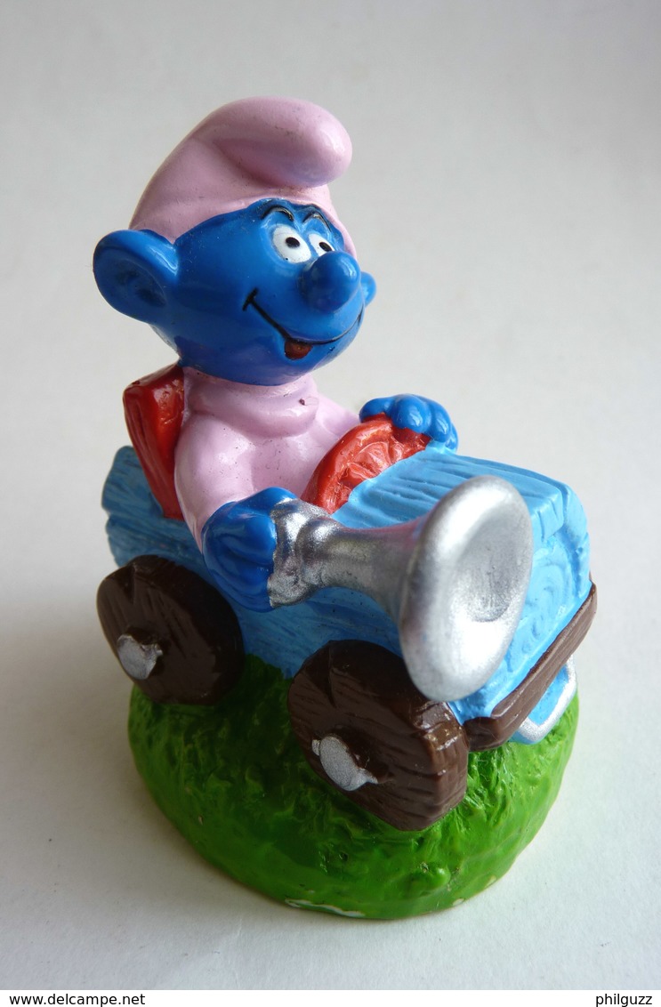 FIGURINE FIZZY BEBE SCHTROUMPF EN VOITURE (1) - Smurfs