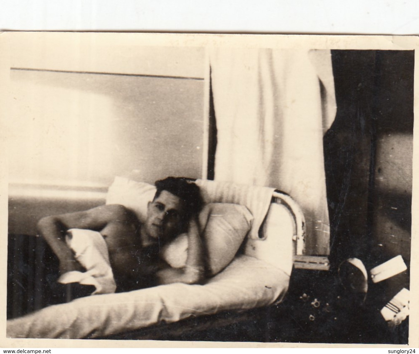 UKRAINE. #1149  A PHOTO. YOUNG MAN LIES ON BED. .  *** - Proyectores De Cine