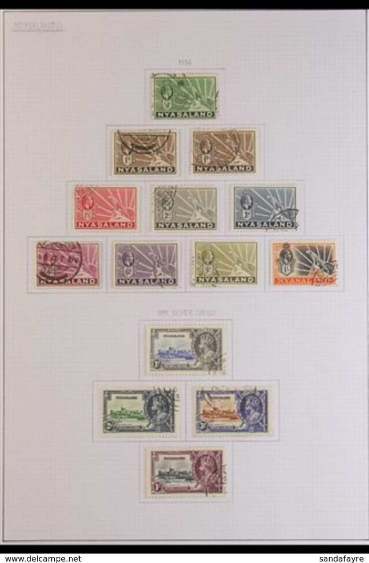 1934-1963 COLLECTION OF USED SETS.  An ALL DIFFERENT Collection Of Complete Sets Including The 1934-35 Symbol Set, 1935  - Nyasaland (1907-1953)