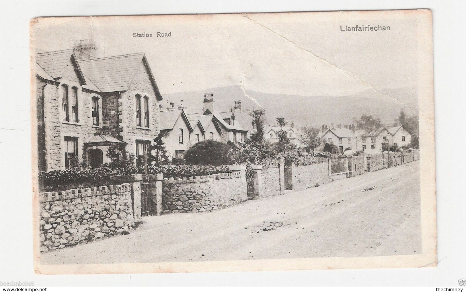 OLD POSTCARD STATION ROAD LLANFAIRFECHAN WALES FAULTS - Caernarvonshire