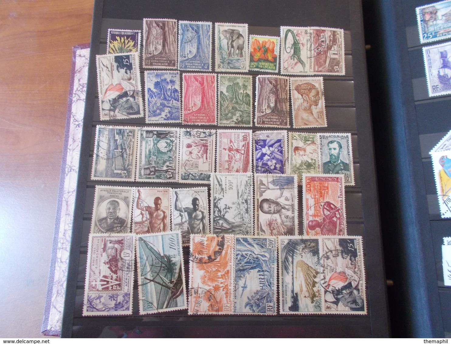 lot n° 480  COLONIES FRANCAISE   timbres obliteres dans une reliure ancienne ,  a vis