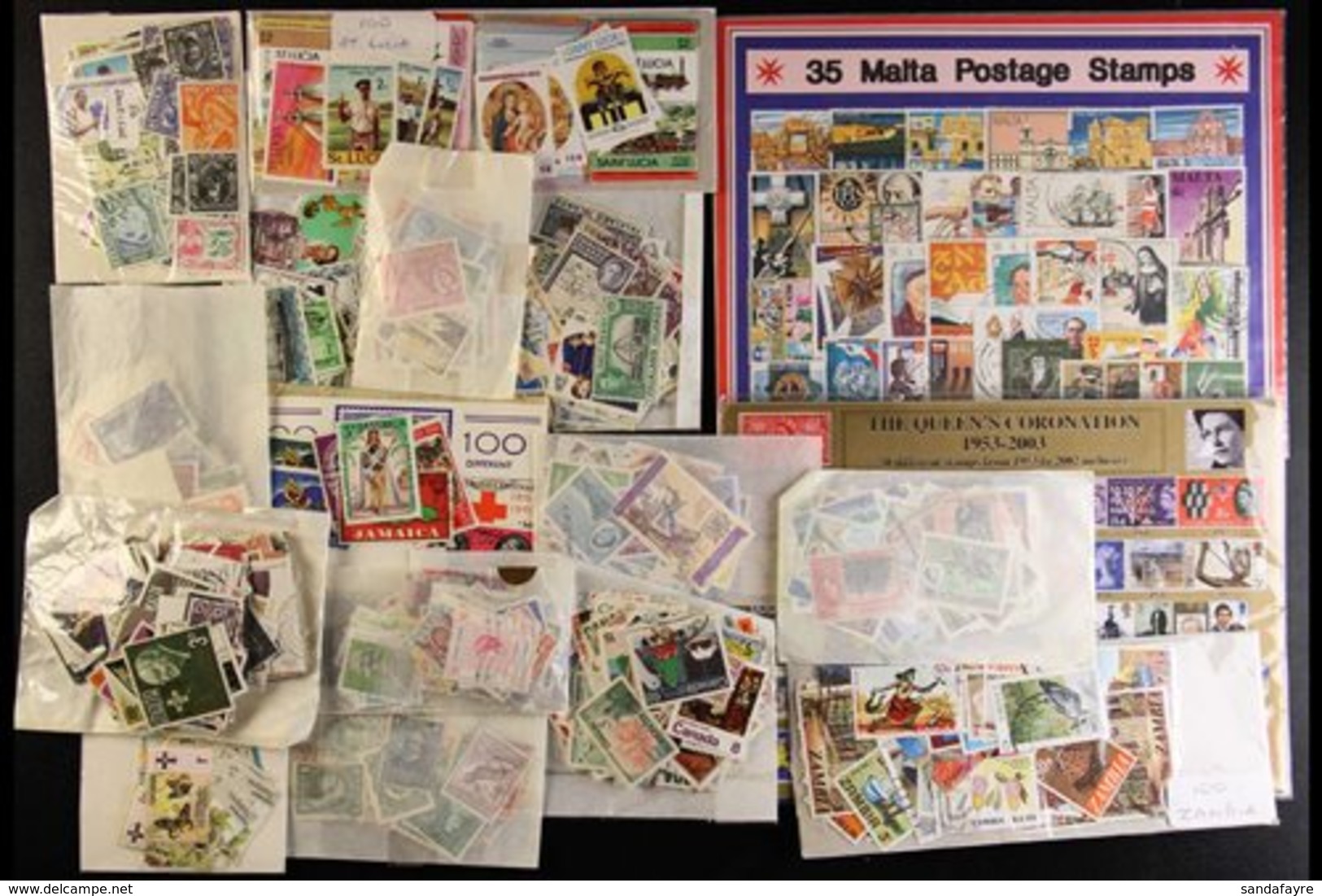 BRITISH COMMONWEALTH MINT & USED PACKET SORTER In A Shoebox. We See A Large Pile Of Unopened Packets & Glassine Envelope - Altri & Non Classificati