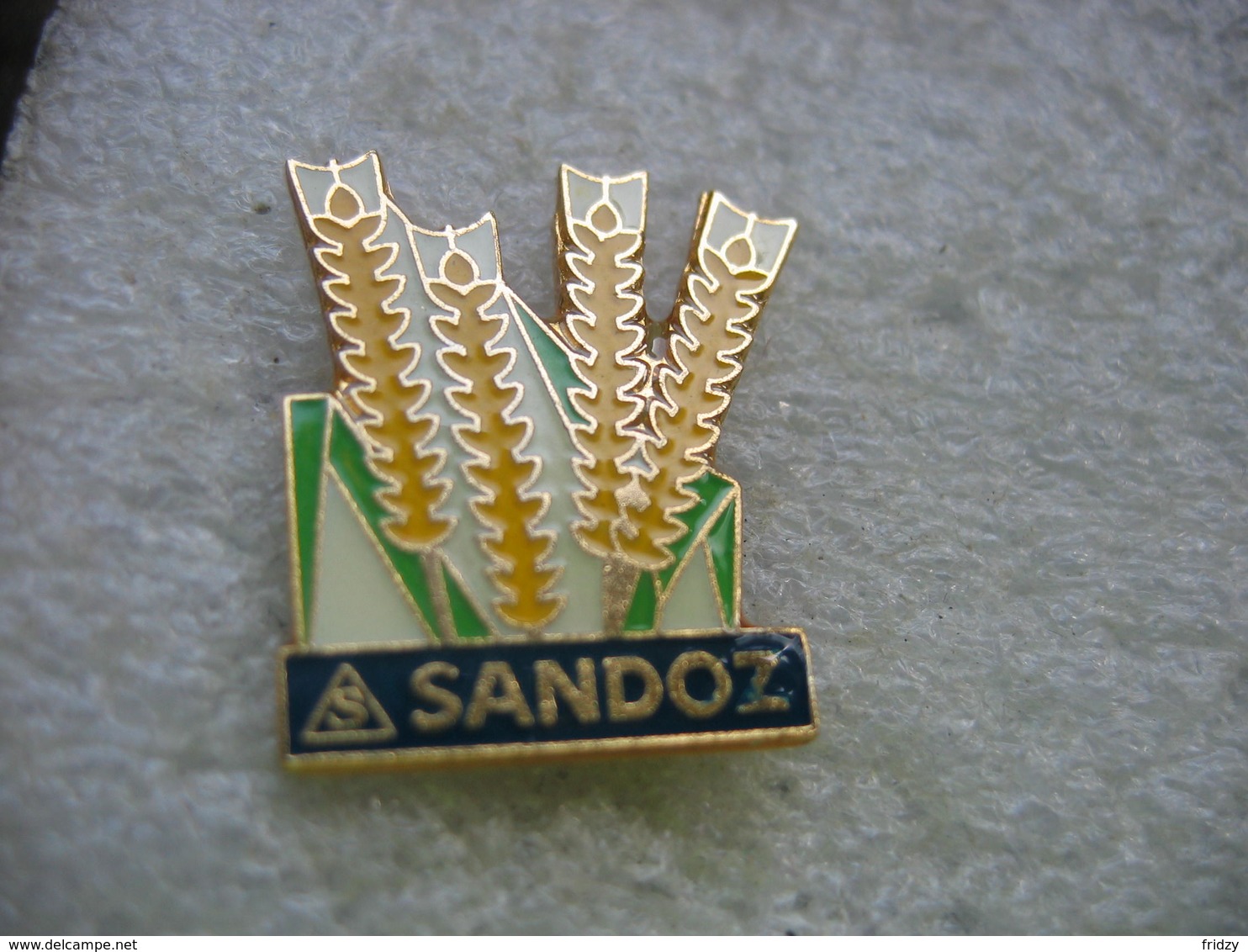 Pin's De La Firme Pharmaceutique Suisse SANDOZ - Autres & Non Classés