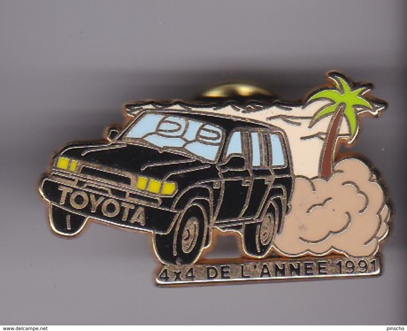 Pin's TOYOTA 4X4 DE L'ANNE 91 SIGNE ARTHUS BERTRAND - Toyota