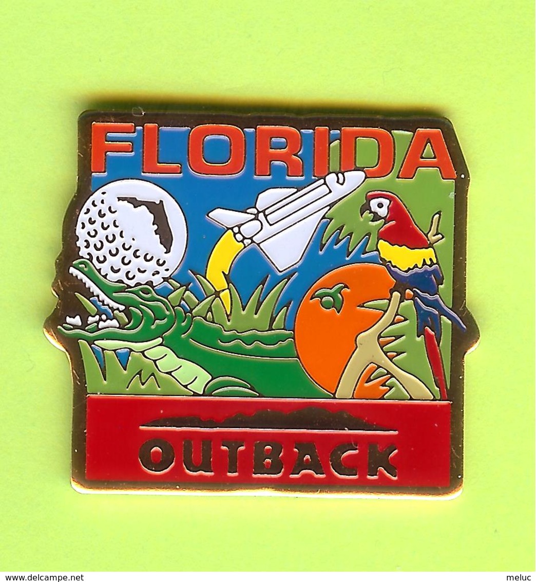 Pin's Outback Steakhouse Florida Perroquet Navette Spatiale Orange - 7CC07 - Animaux