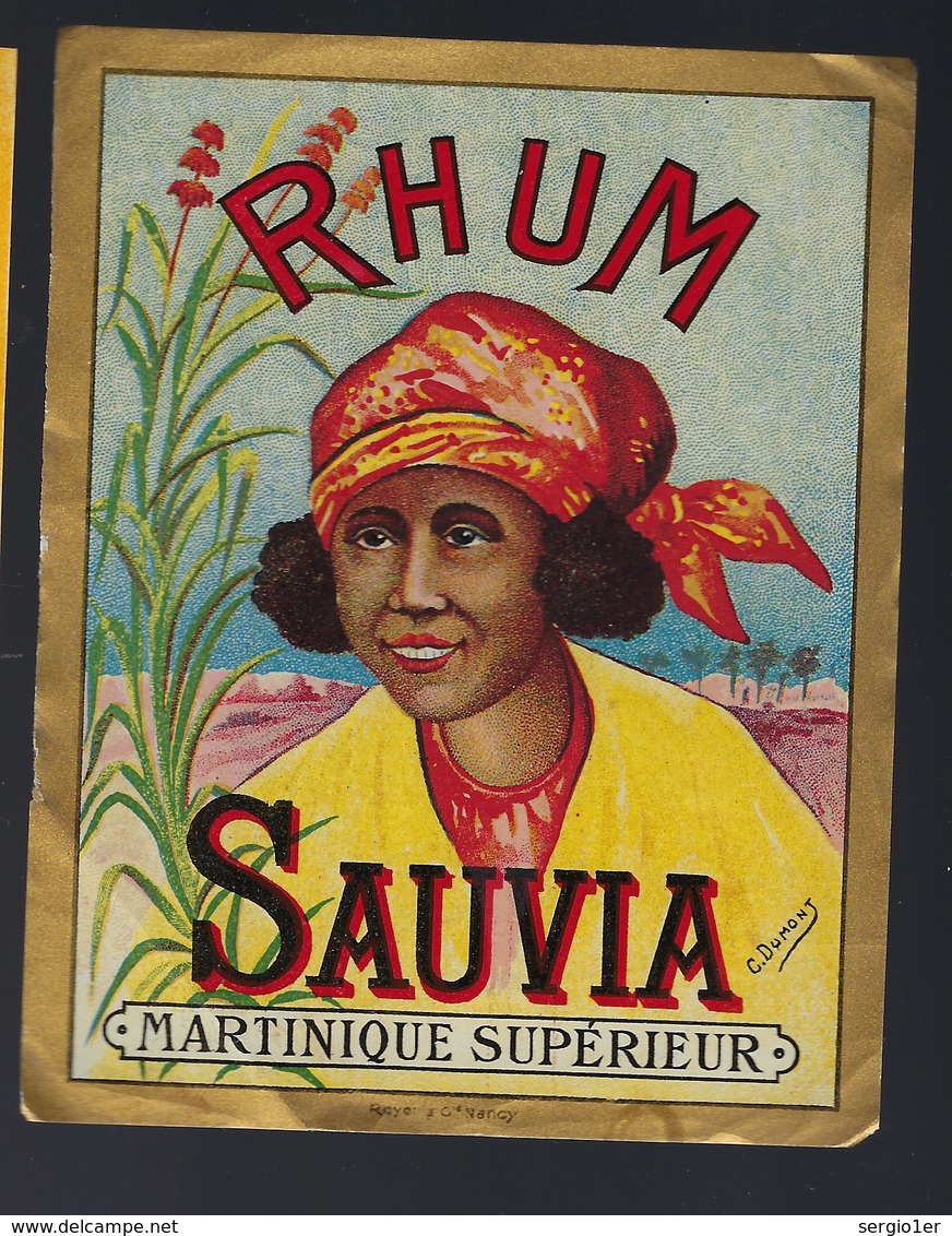 Ancienne étiquette  Rhum  Martinique Supérieur Sauvia  Signée C Dumont "visage Femme Coiffe" Imp Royot & Cie Nancy - Rhum