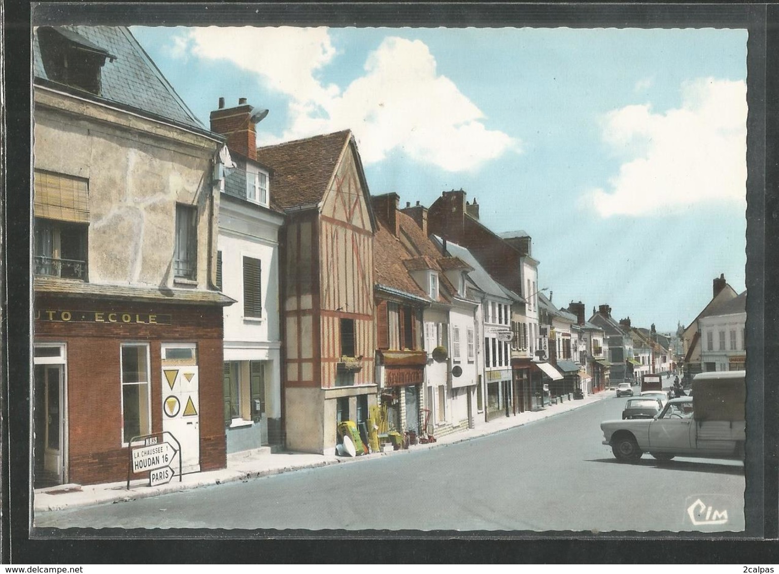 27 - Eure - Ivry La Bataille - Carte Peu Courante :  Le Bourg - Auto Ecole - - Ivry-la-Bataille