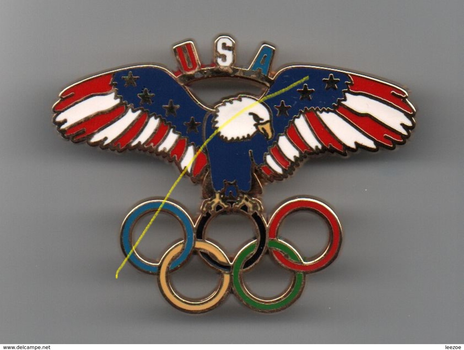 Pin's SUPER MAX PIN'S JEUX OLYMPIQUES : AIGLE Aux Anneaux Olympiques, (c)USA TEAM 1994 En Zamac Doré  ....BT11 - Jeux Olympiques