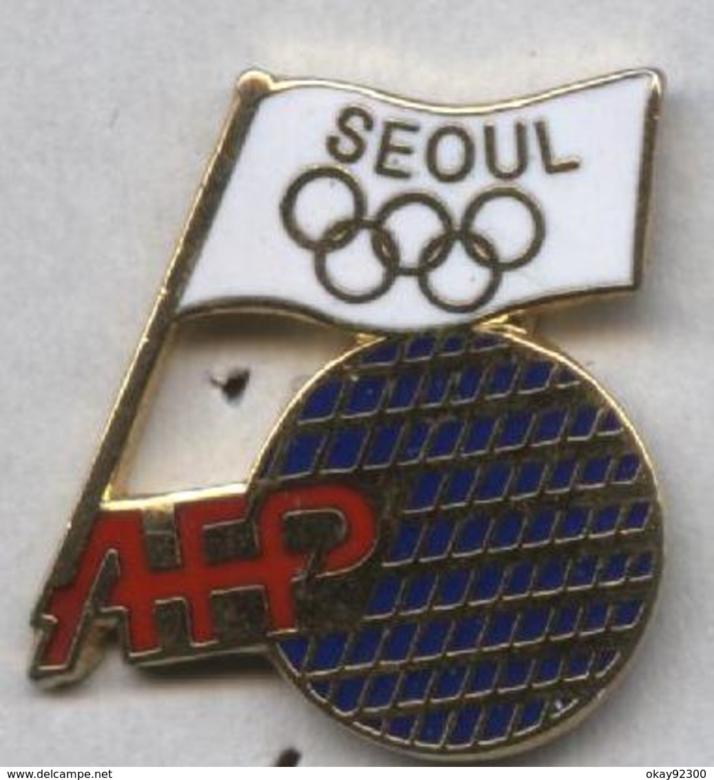 Pin's Média AFP Agence France Presse JO Jeux Olympiques Olympic Games Séoul 1988 - Médias