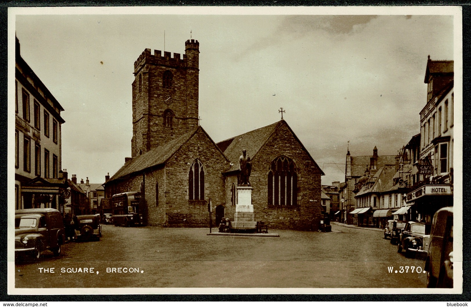 Ref 1286 - Real Photo Postcard - Bus Cars & Hotel - The Square Brecon - Breconshire Wales - Breconshire