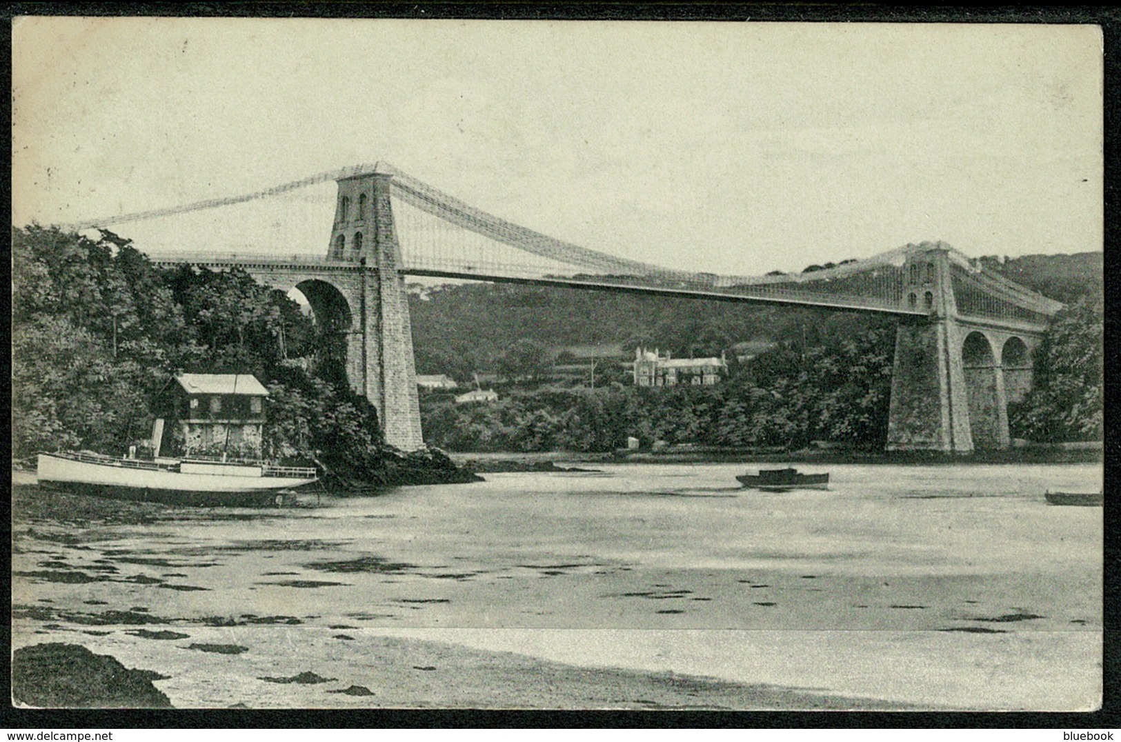 Ref 1287 - 1905 Peacock Postcard - Menai Suspension Bridge & Steam Ship Wales - Caernarvonshire