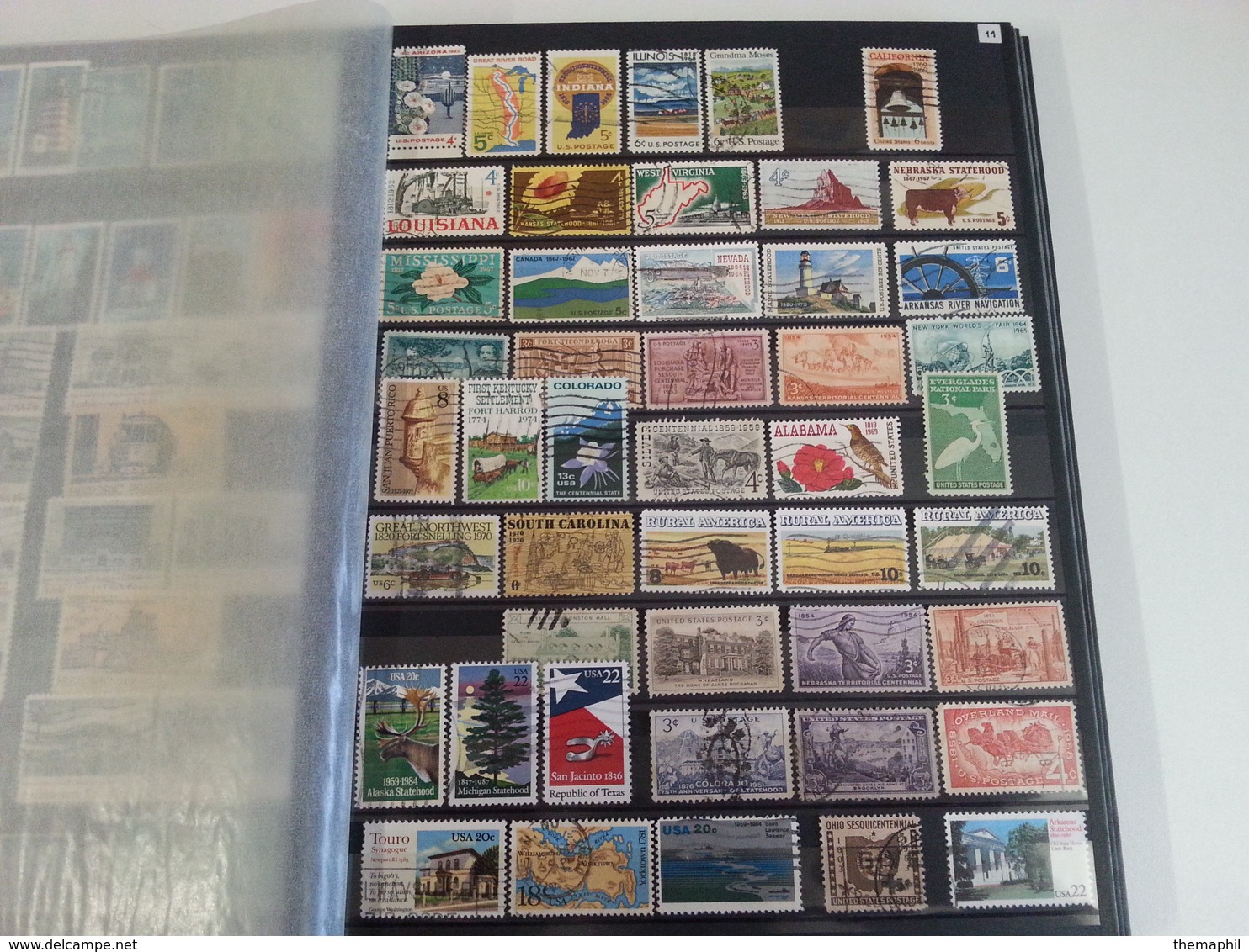 lot n° 524  ETATS UNIS  etc..  un bon classeur de timbres neufs  ou obl