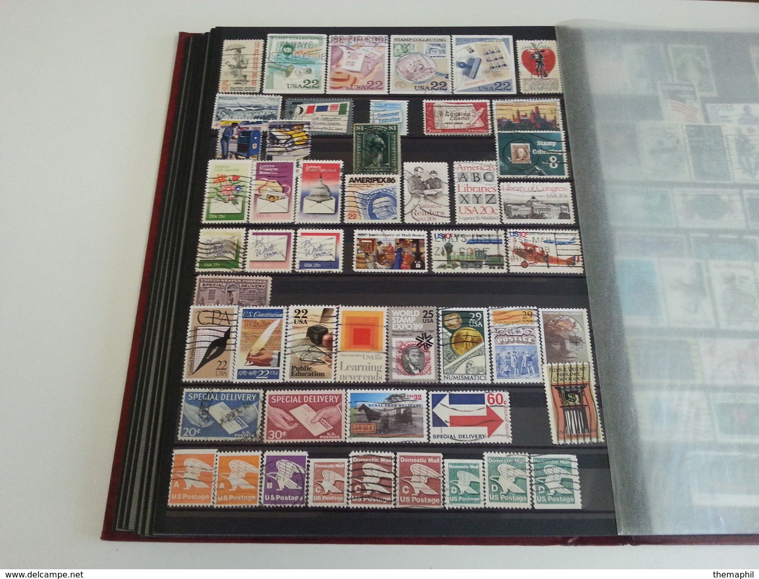 lot n° 524  ETATS UNIS  etc..  un bon classeur de timbres neufs  ou obl