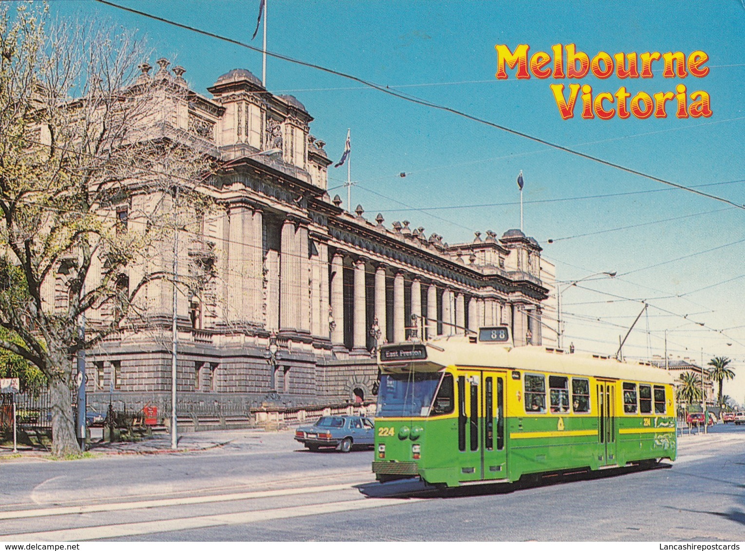 Postcard Tram Passing Victorian State Parliament Hose Melbourne Australia PU 1985  My Ref  B23594 - Tramways