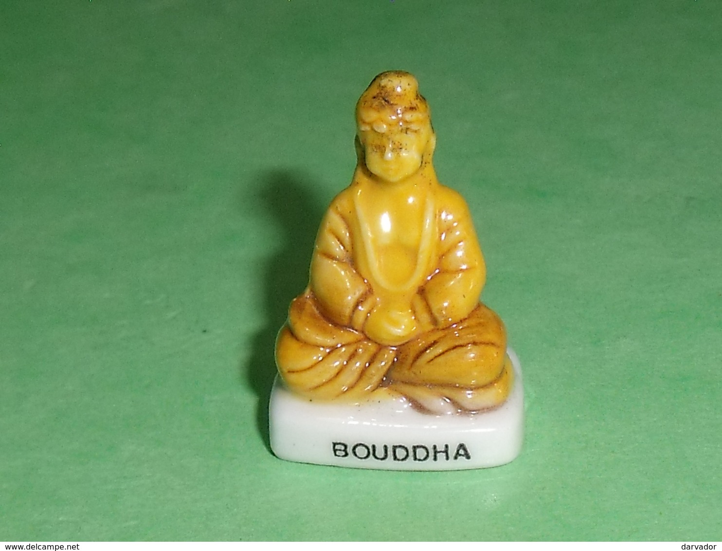 Fèves / Autres / Divers : Statue , Bouddha   T77 - Autres & Non Classés