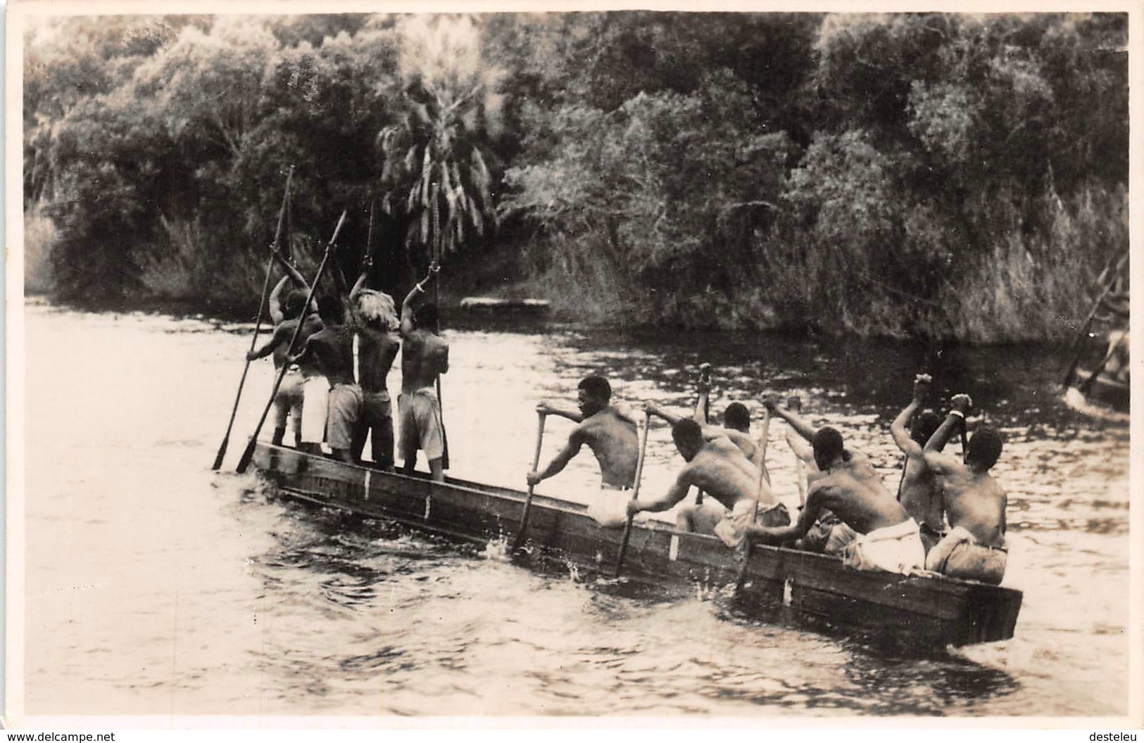 A Native Canoe On The Zambezi River Above The Victoria Falls  ZAMBIA - Zambia