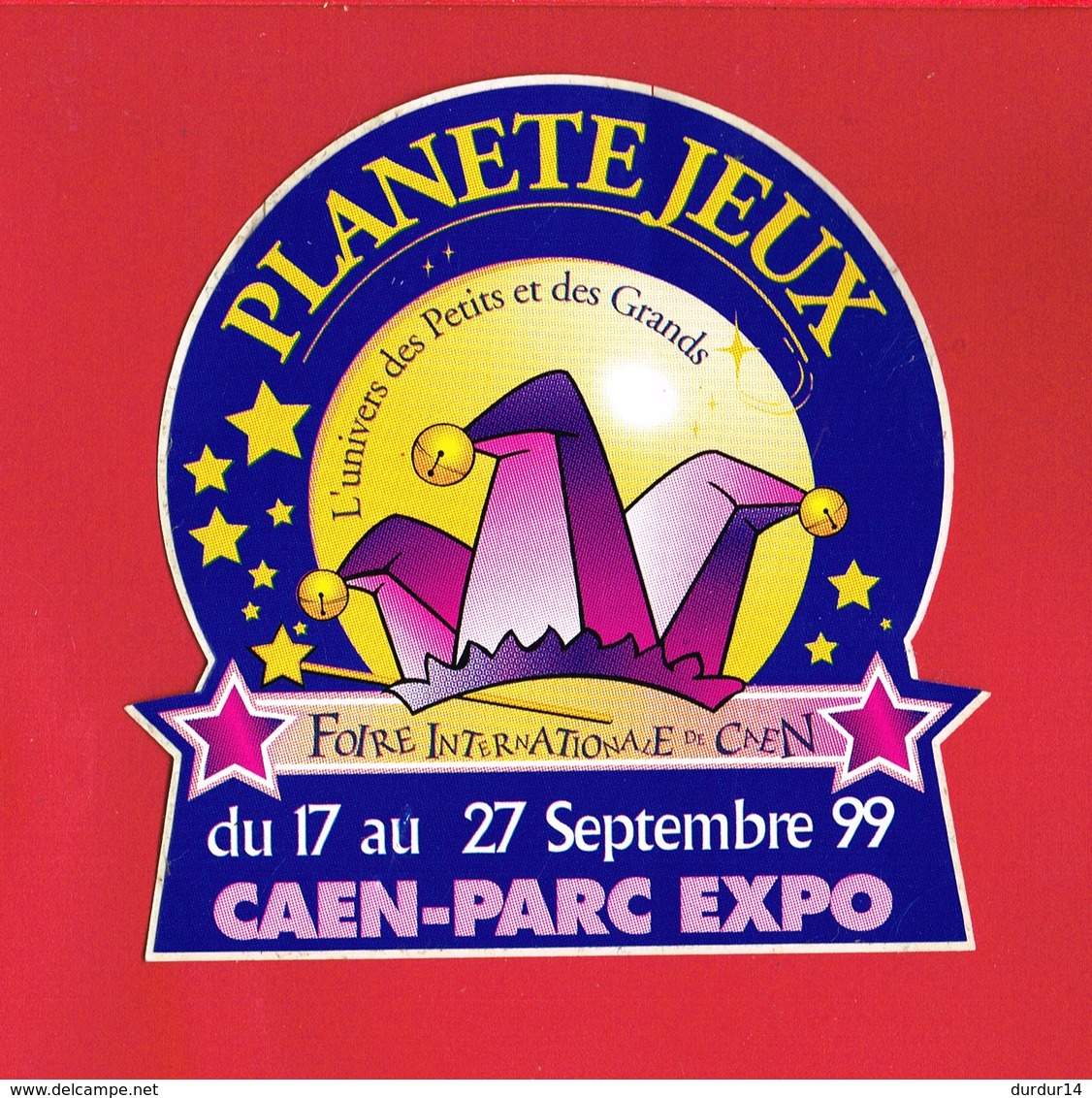 1 Autocollant FOIRE INTERNATIONALE DE CAEN 1999 PLANETE JEUX - Autocollants