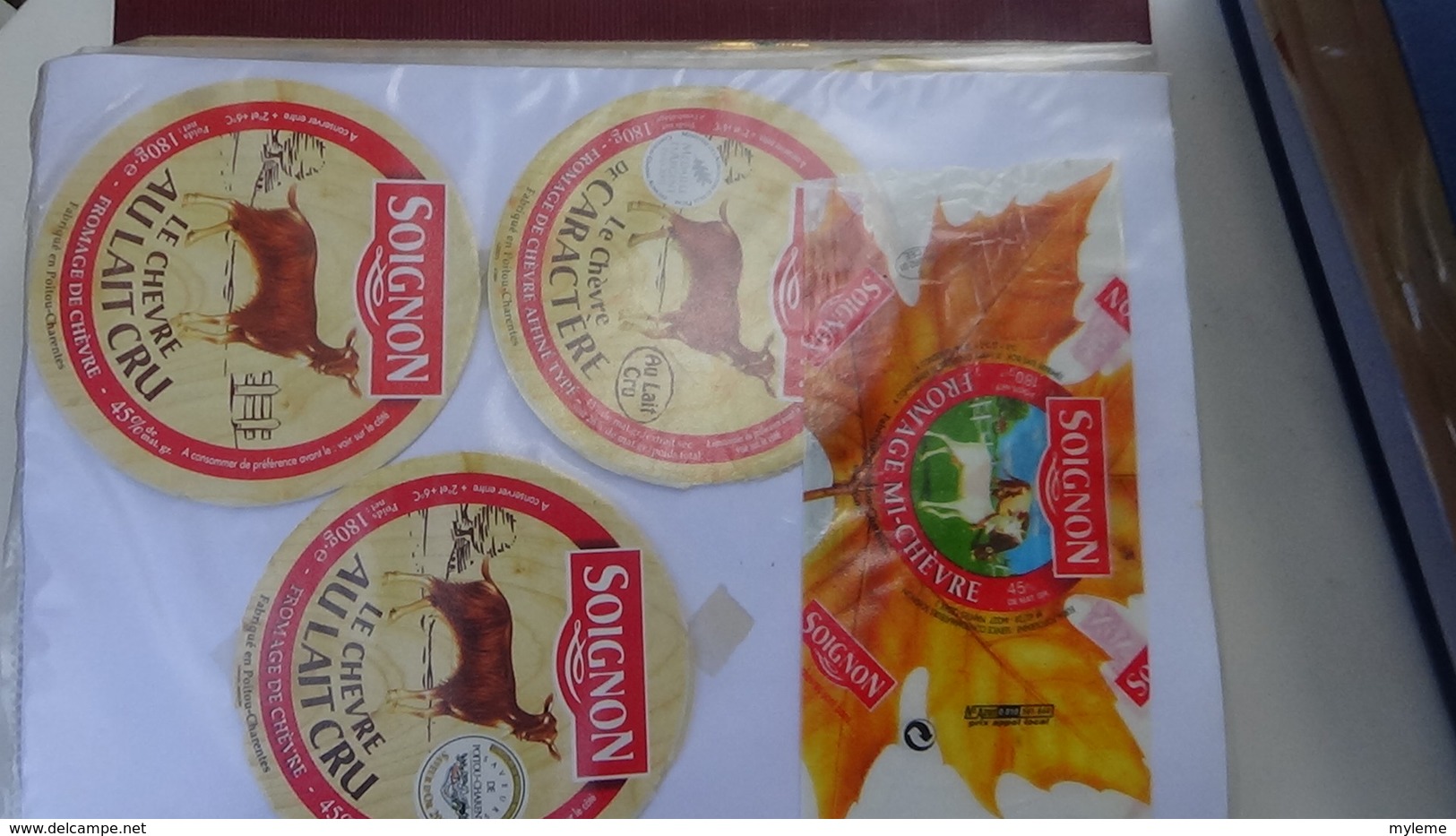 Grosse collection de couvercles et étiquettes (131 dans ce classeur) de fromages Français.2/10 Voir commentaires !!!