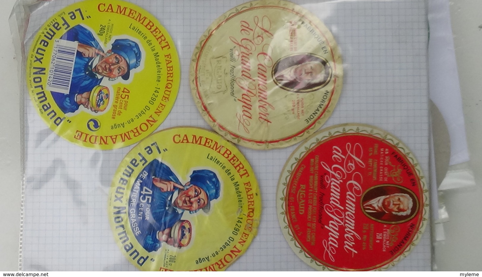 Grosse collection de couvercles et étiquettes (186 dans ce classeur) de fromages Français.8/10 Voir commentaires !!!