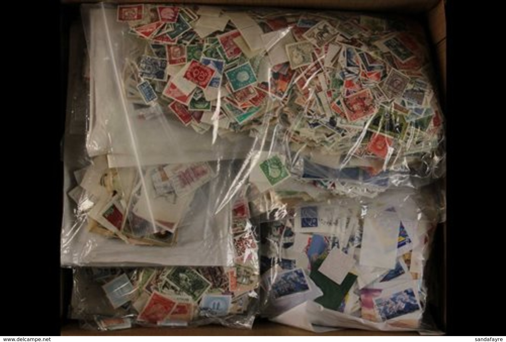 WORLD HOARD IN LARGE PACKS 20th Century Used Loose Stamps In Several Large Plastic Packs, Some On Pieces, Unsorted And U - Andere & Zonder Classificatie